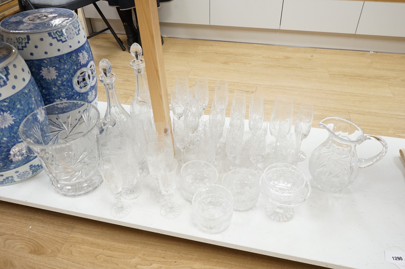 A suite of crystal glassware, to include decanters, jug, bowls, etc., tallest decanter 38cm.
